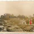 [7TP][#502]{001}{b} Pz.Rgt.1, #401, Niewiadów (desc. Foto polnischer 7 TP Panzer mit Beute Balkenkreuz auf Marktplatz in Polen 1939 ).jpg