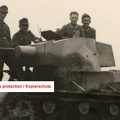 [7TP][#168]{002}{a} 1.BCzL, Tomaszów Lubelski, górale, w tle budynki cw