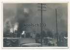 [Z.Art.Rgt.103.001] Foto Fahrzeuge der Wehrmacht in einer brennenden Ortschaft in Polen 1939