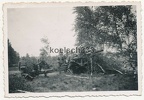 [Z.Art.Rgt.103.001] Foto Kanoniere der Wehrmacht an einer Feldhaubitze in Feuerstellung in Polen